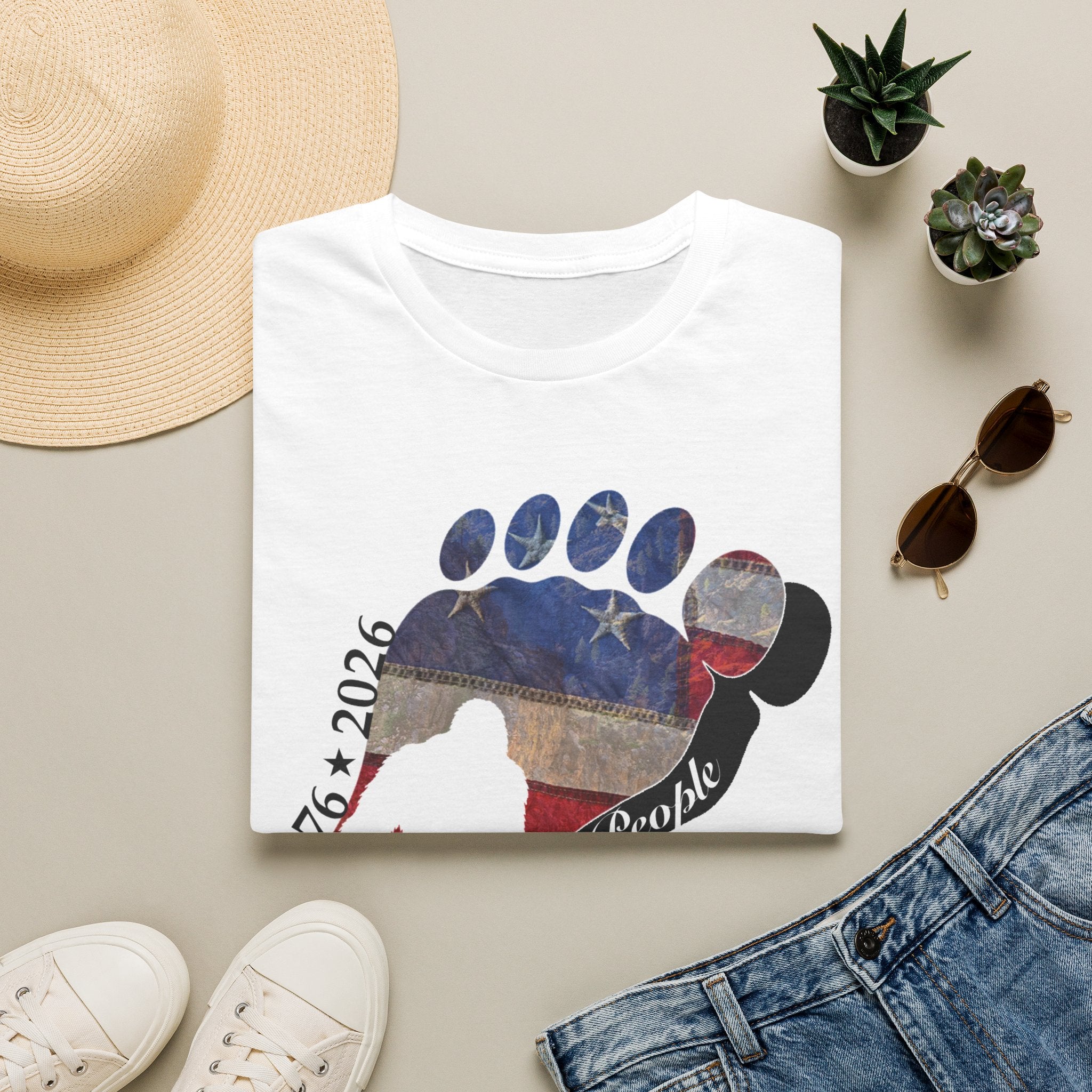 Going Norther Bigfoot T-Shirt — Footprint Silhouette with Distressed Flag & "1776 - 2026 - We The People"