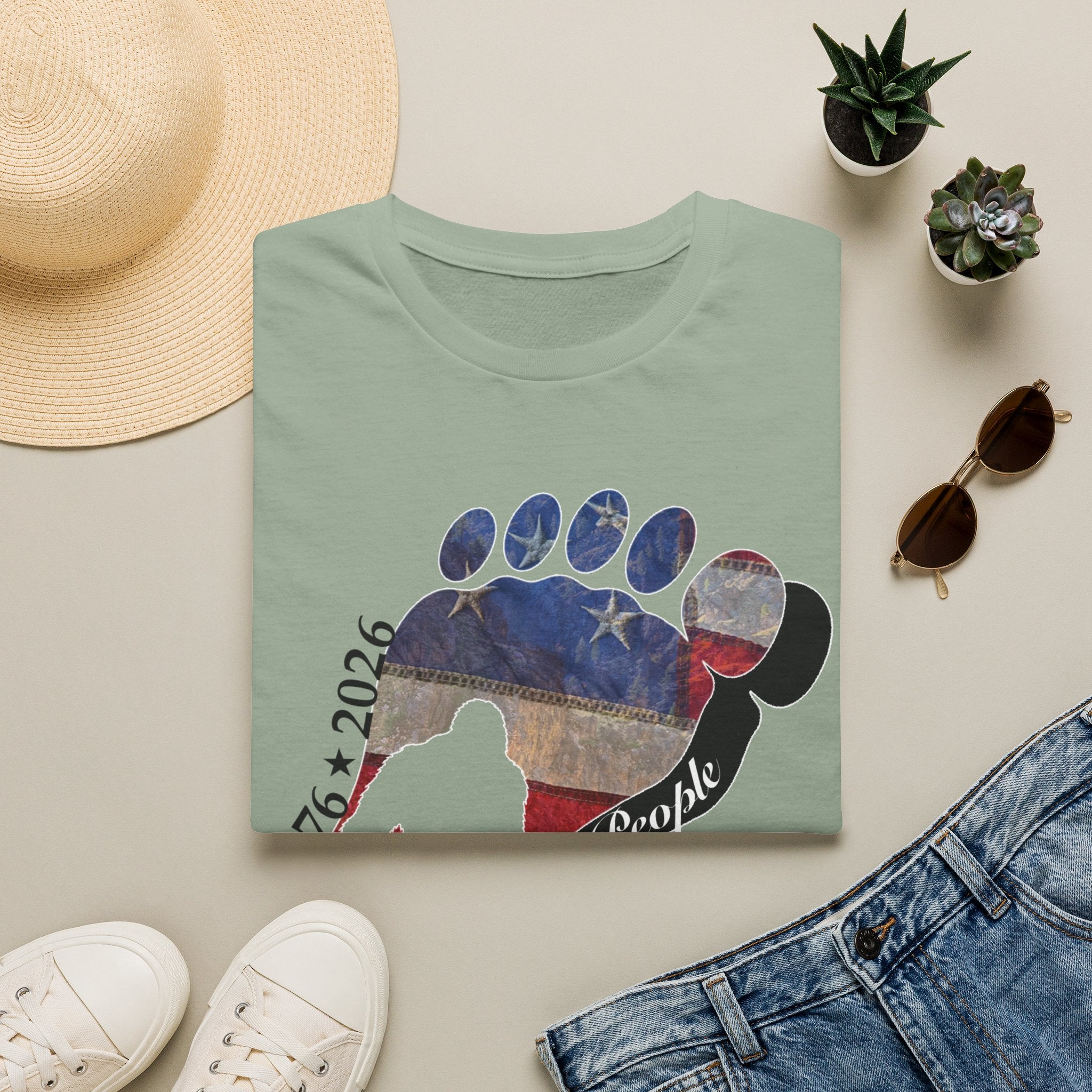 Going Norther Bigfoot T-Shirt — Footprint Silhouette with Distressed Flag & "1776 - 2026 - We The People"