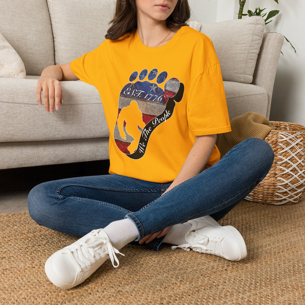 Going Norther Bigfoot T-Shirt — Footprint Silhouette with Distressed Flag "EST. 1776 - We The People"