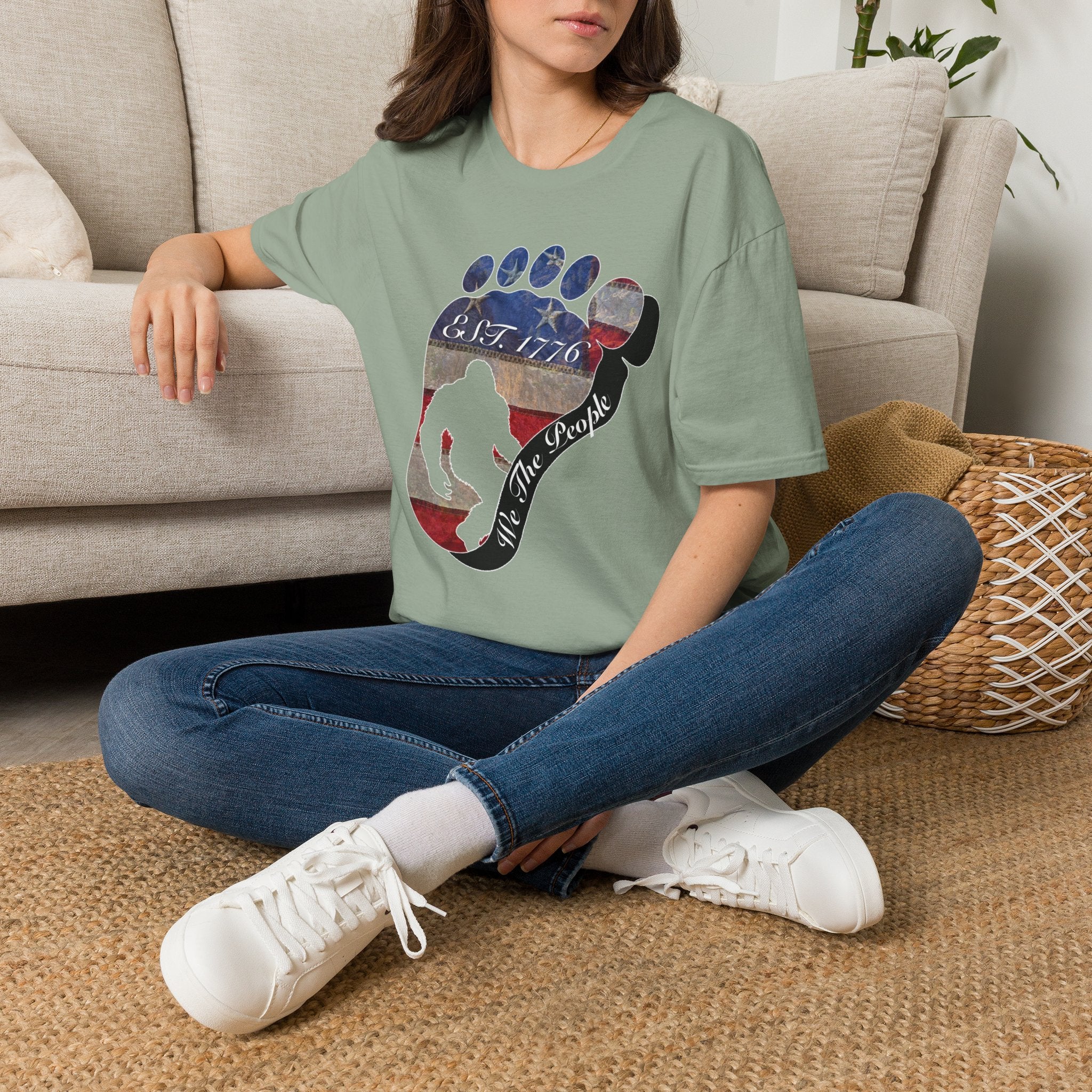 Going Norther Bigfoot T-Shirt — Footprint Silhouette with Distressed Flag "EST. 1776 - We The People"
