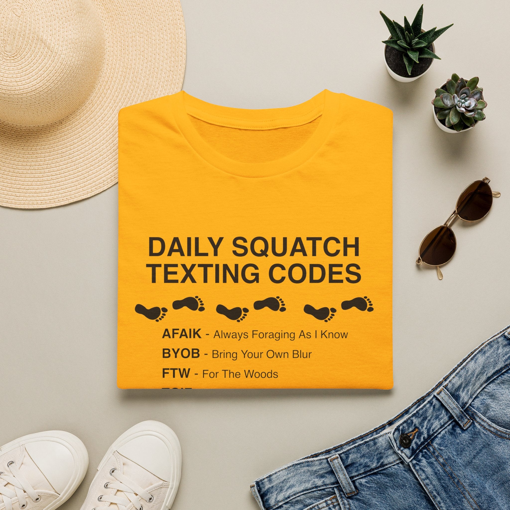 Daily Squatch Texting Codes T-Shirt — Funny Sasquatch Footprint Tee for Bigfoot Fans