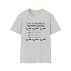 Daily Squatch Texting Codes T-Shirt — Funny Sasquatch Footprint Tee for Bigfoot Fans