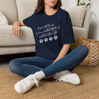 Wolf Paw Graphic T-Shirt — "To Be One with the Land" Script Tee