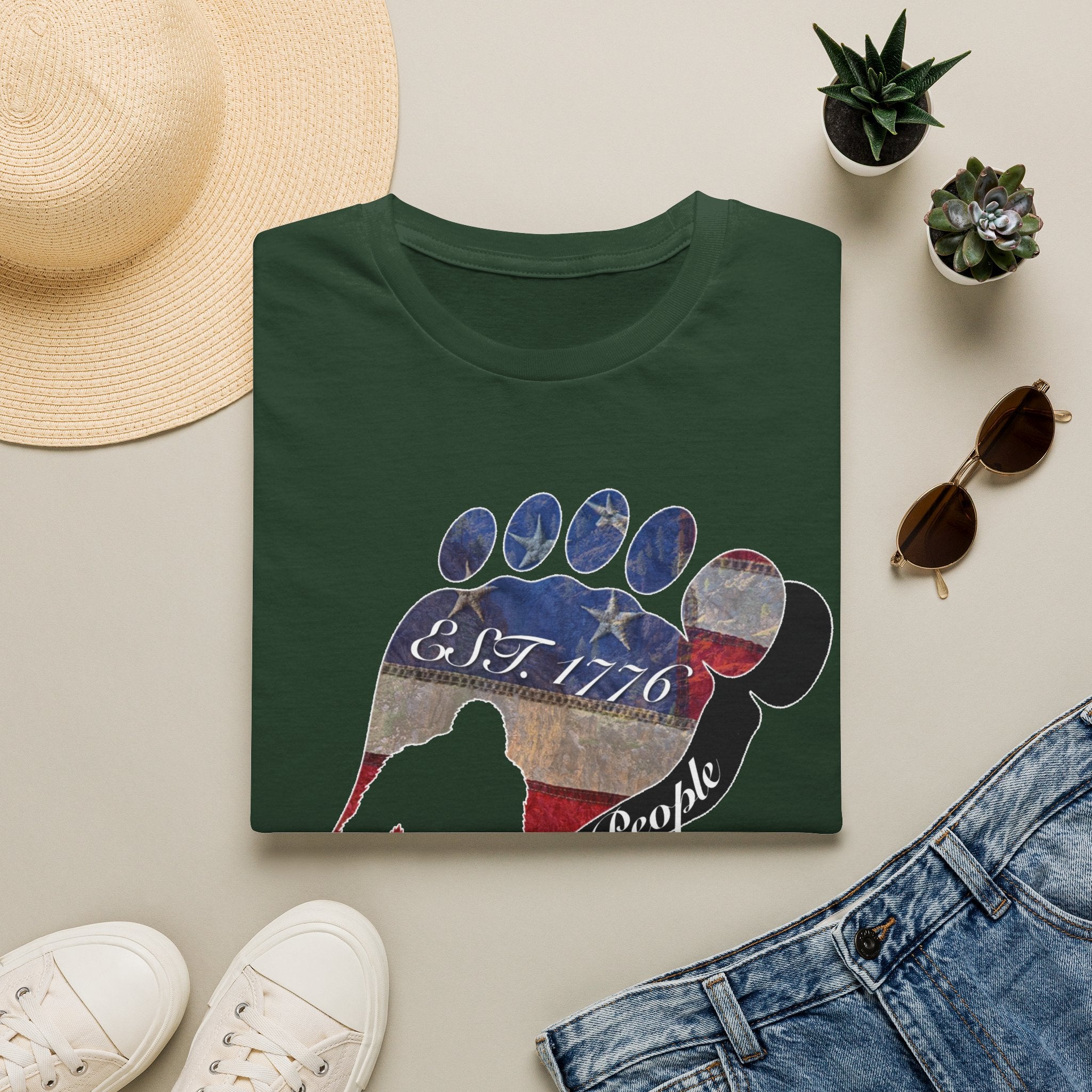 Going Norther Bigfoot T-Shirt — Footprint Silhouette with Distressed Flag "EST. 1776 - We The People"