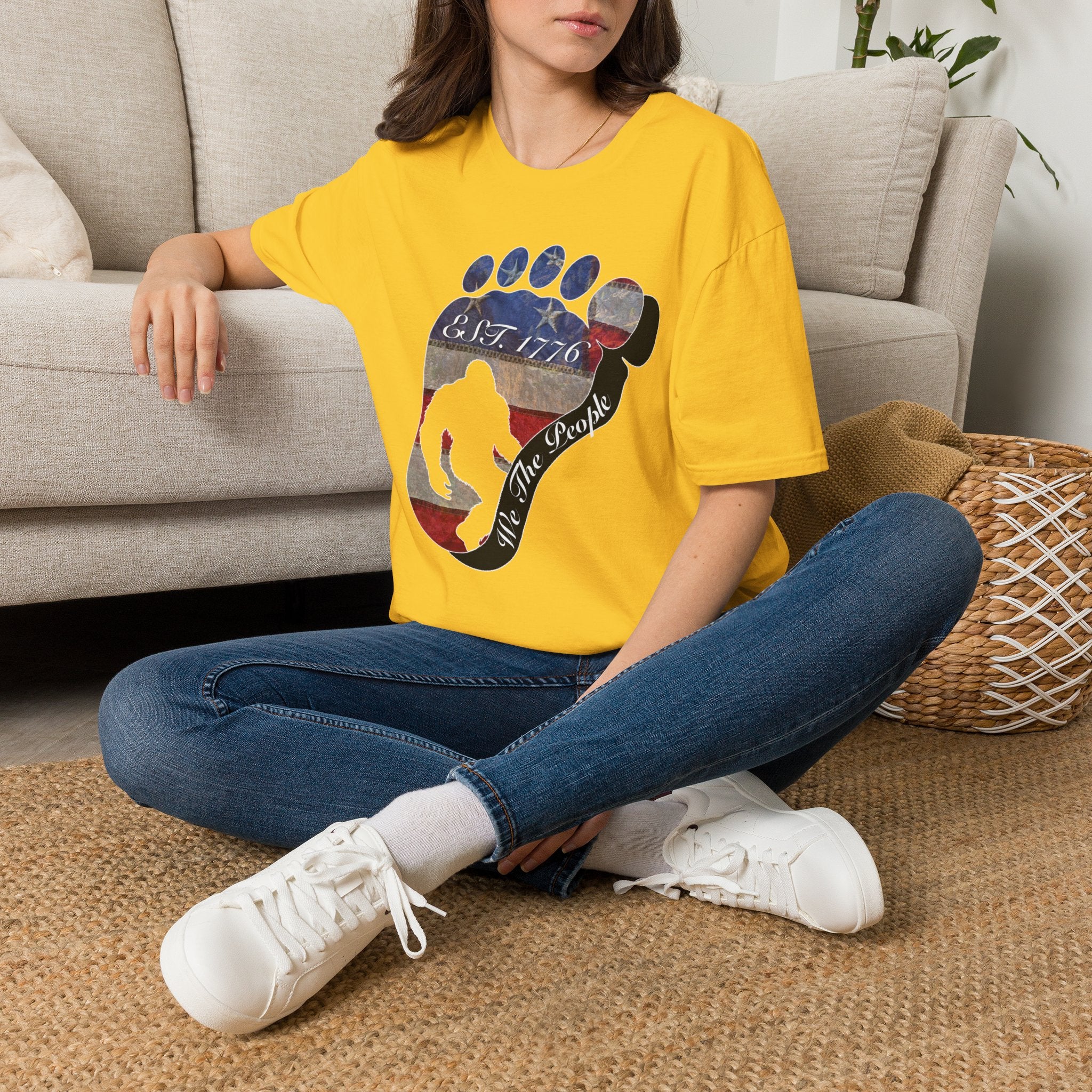 Going Norther Bigfoot T-Shirt — Footprint Silhouette with Distressed Flag "EST. 1776 - We The People"