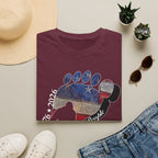 Going Norther Bigfoot T-Shirt — Footprint Silhouette with Distressed Flag & "1776 - 2026 - We The People"