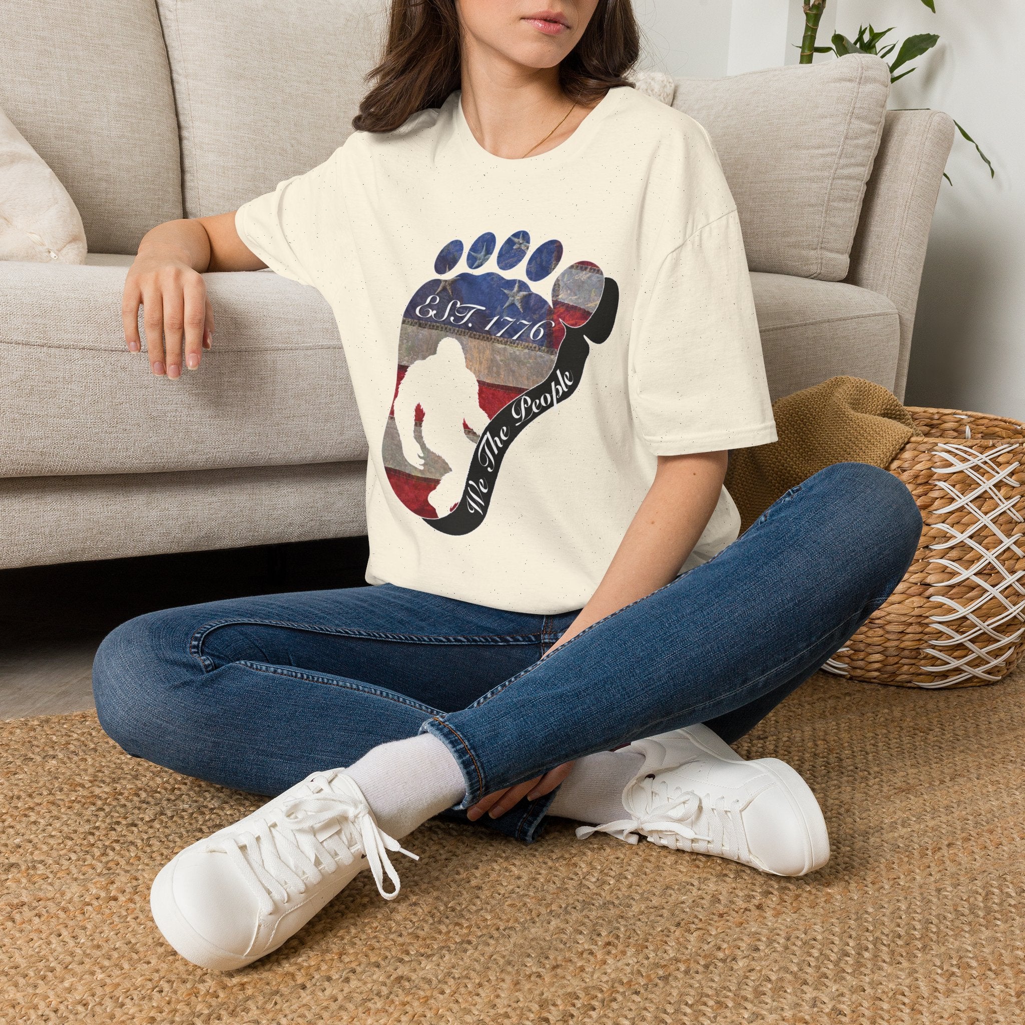 Going Norther Bigfoot T-Shirt — Footprint Silhouette with Distressed Flag "EST. 1776 - We The People"