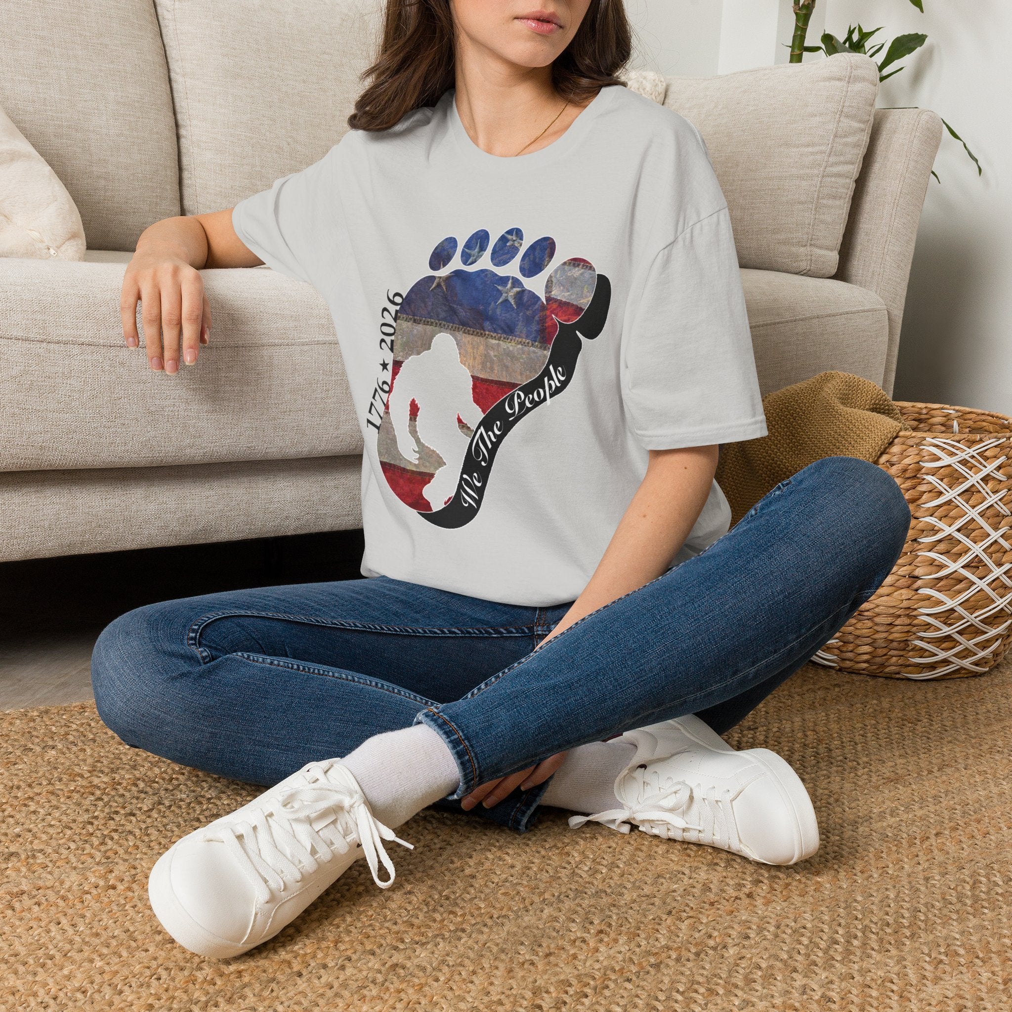 Going Norther Bigfoot T-Shirt — Footprint Silhouette with Distressed Flag & "1776 - 2026 - We The People"