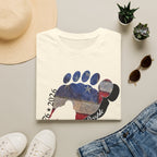 Going Norther Bigfoot T-Shirt — Footprint Silhouette with Distressed Flag & "1776 - 2026 - We The People"