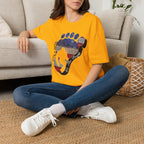 Going Norther Bigfoot T-Shirt — Footprint Silhouette with Distressed Flag & "1776 - 2026 - We The People"
