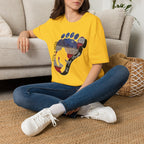 Going Norther Bigfoot T-Shirt — Footprint Silhouette with Distressed Flag & "1776 - 2026 - We The People"