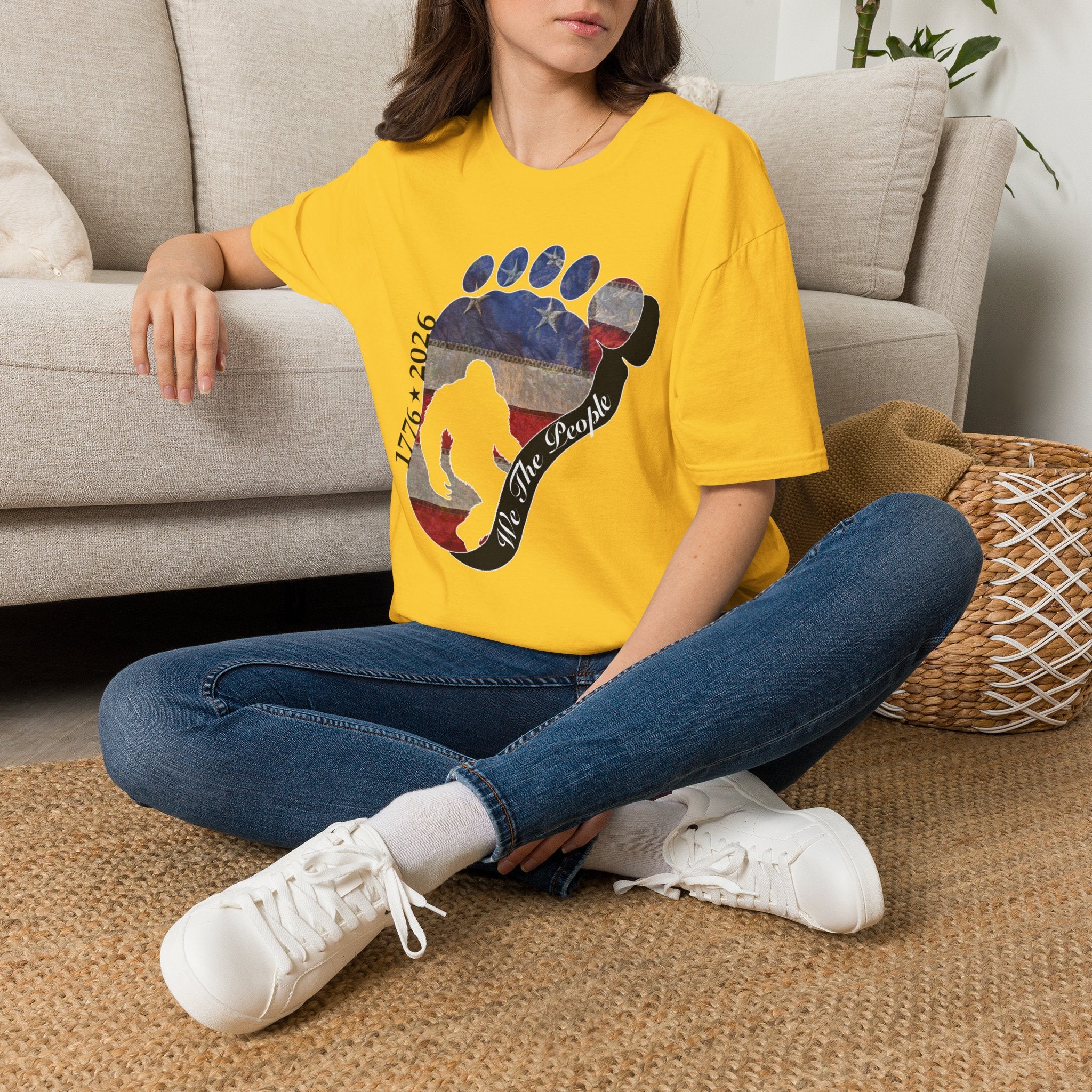 Going Norther Bigfoot T-Shirt — Footprint Silhouette with Distressed Flag & "1776 - 2026 - We The People"