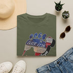 Going Norther Bigfoot T-Shirt — Footprint Silhouette with Distressed Flag "EST. 1776 - We The People"