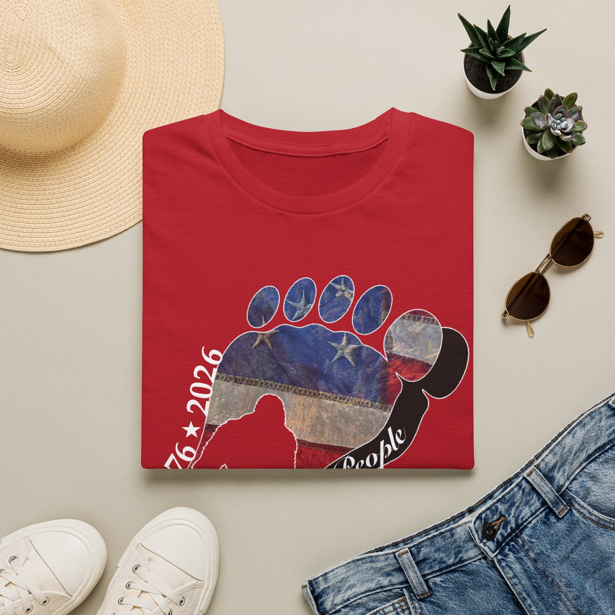 Going Norther Bigfoot T-Shirt — Footprint Silhouette with Distressed Flag & "1776 - 2026 - We The People"