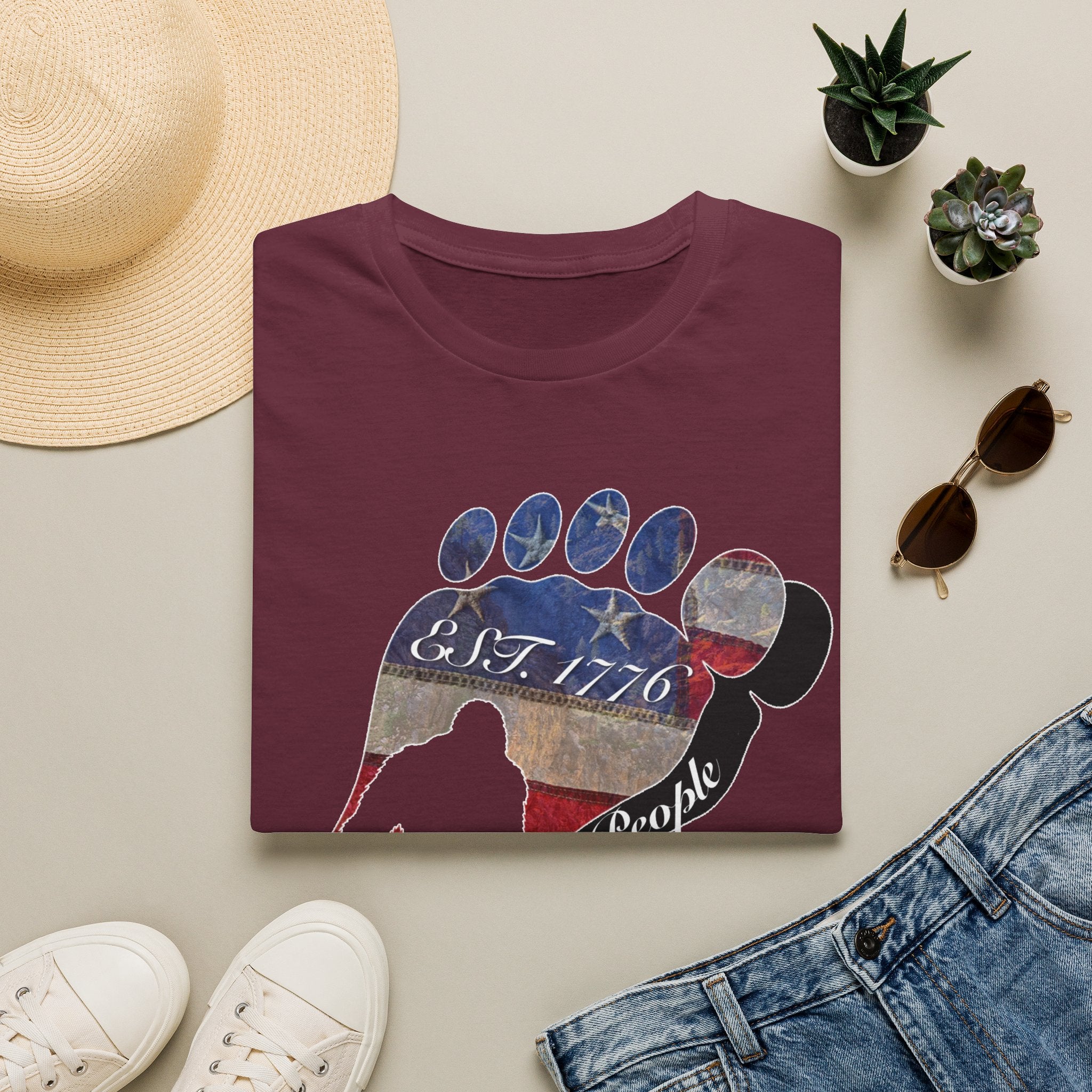 Going Norther Bigfoot T-Shirt — Footprint Silhouette with Distressed Flag "EST. 1776 - We The People"