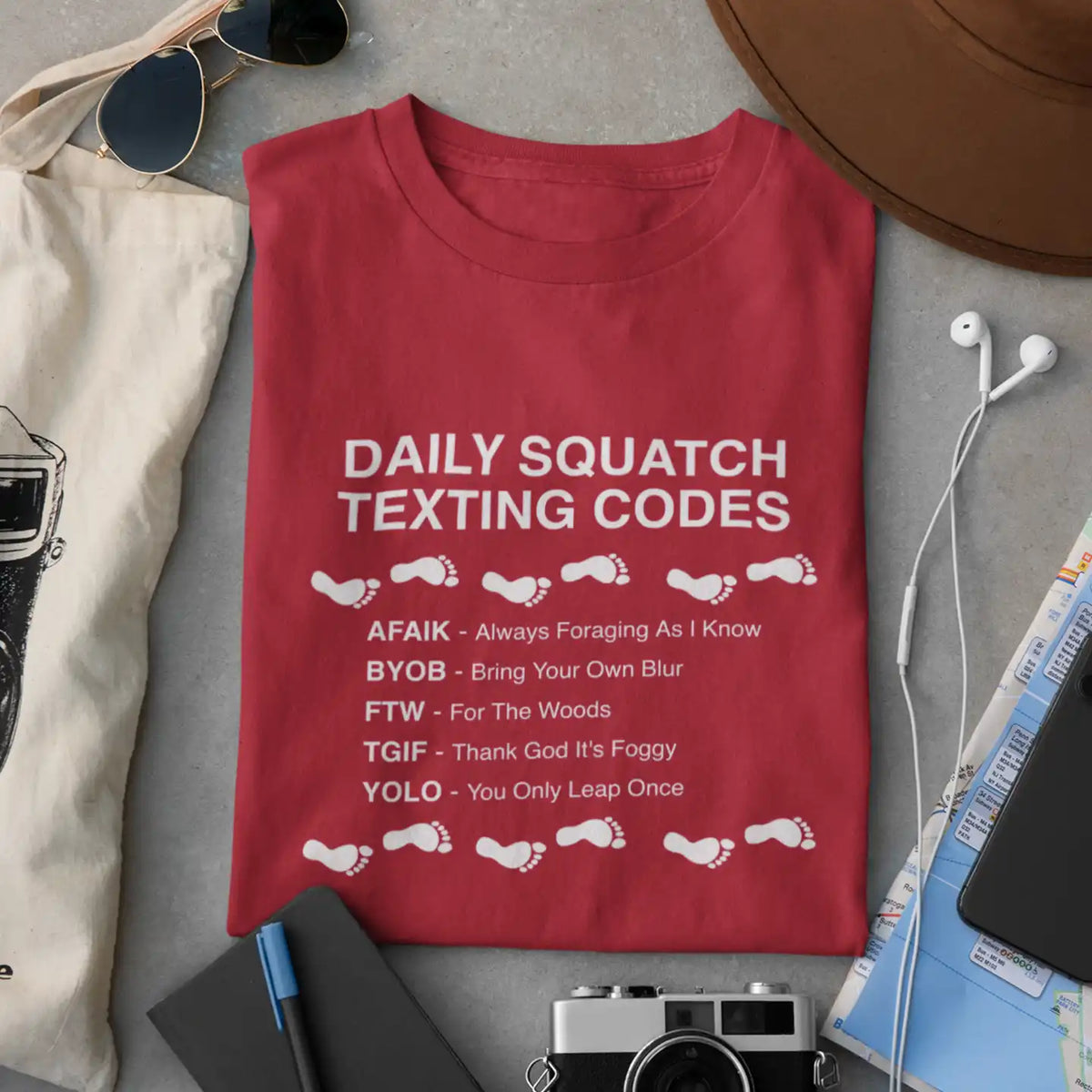 Daily Squatch Texting Codes T-Shirt — Funny Sasquatch Footprint Tee for Bigfoot Fans