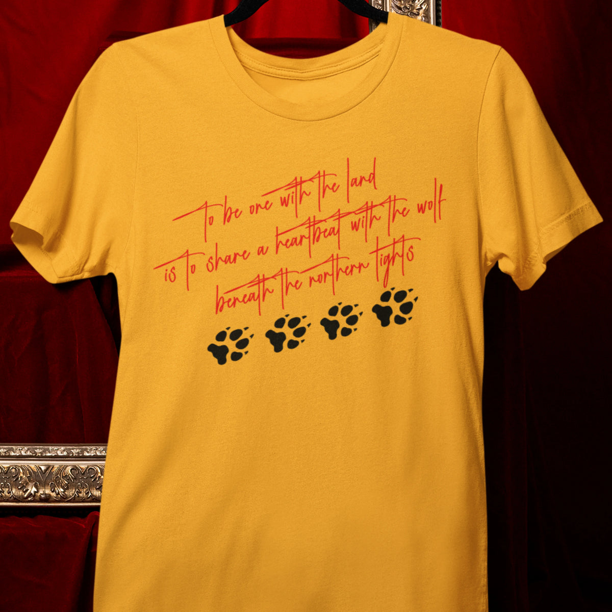 Wolf Paw Graphic T-Shirt — "To Be One with the Land" Script Tee
